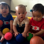 Hui Infant Boys Playing with Balls