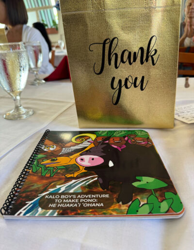 Ho'oikaika-Partnership-Celebration-Mahalo-Thank you-gift-bag-Kalo-Boy-Book-on-the-table